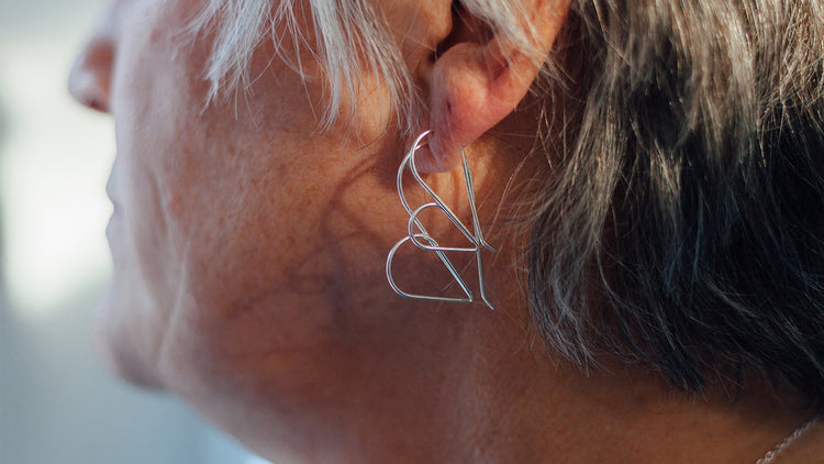 Heart and XO studs, threader hoops and necklaces handmade by Cindy Liebel Jewelry