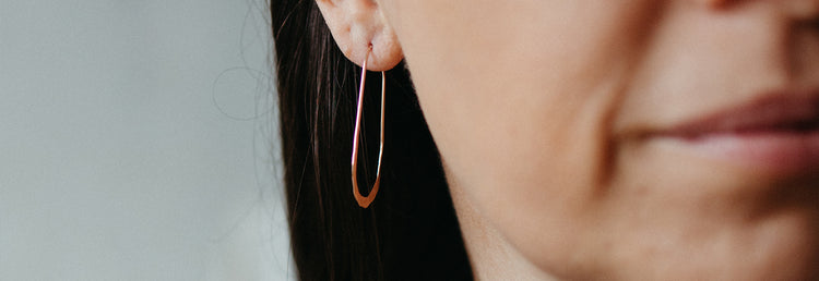 Refined diamond and colored gemstone jewelry handcrafted with recycled precious metals