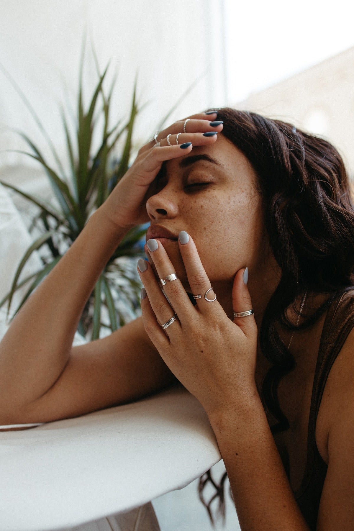 Everyday silver stacking rings styled on model