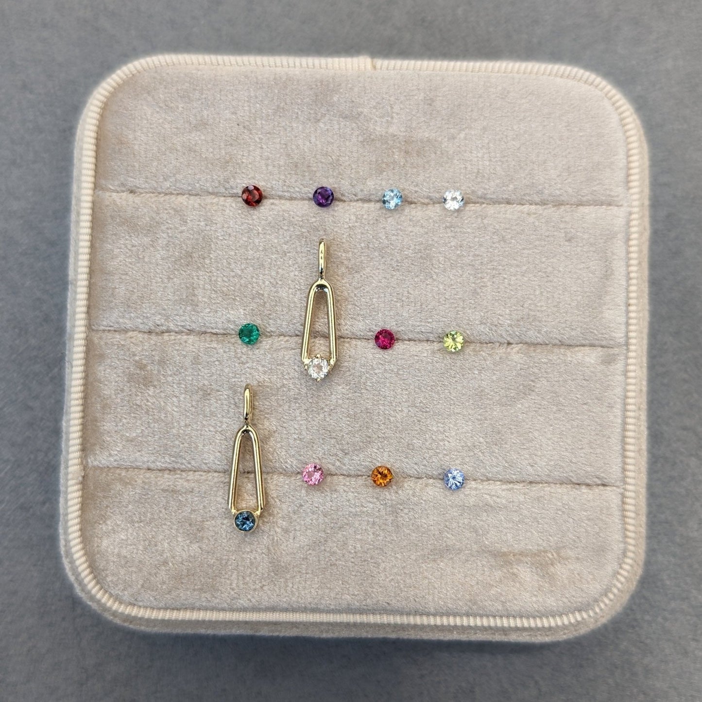 Birthstone charm pendants in 14K gold