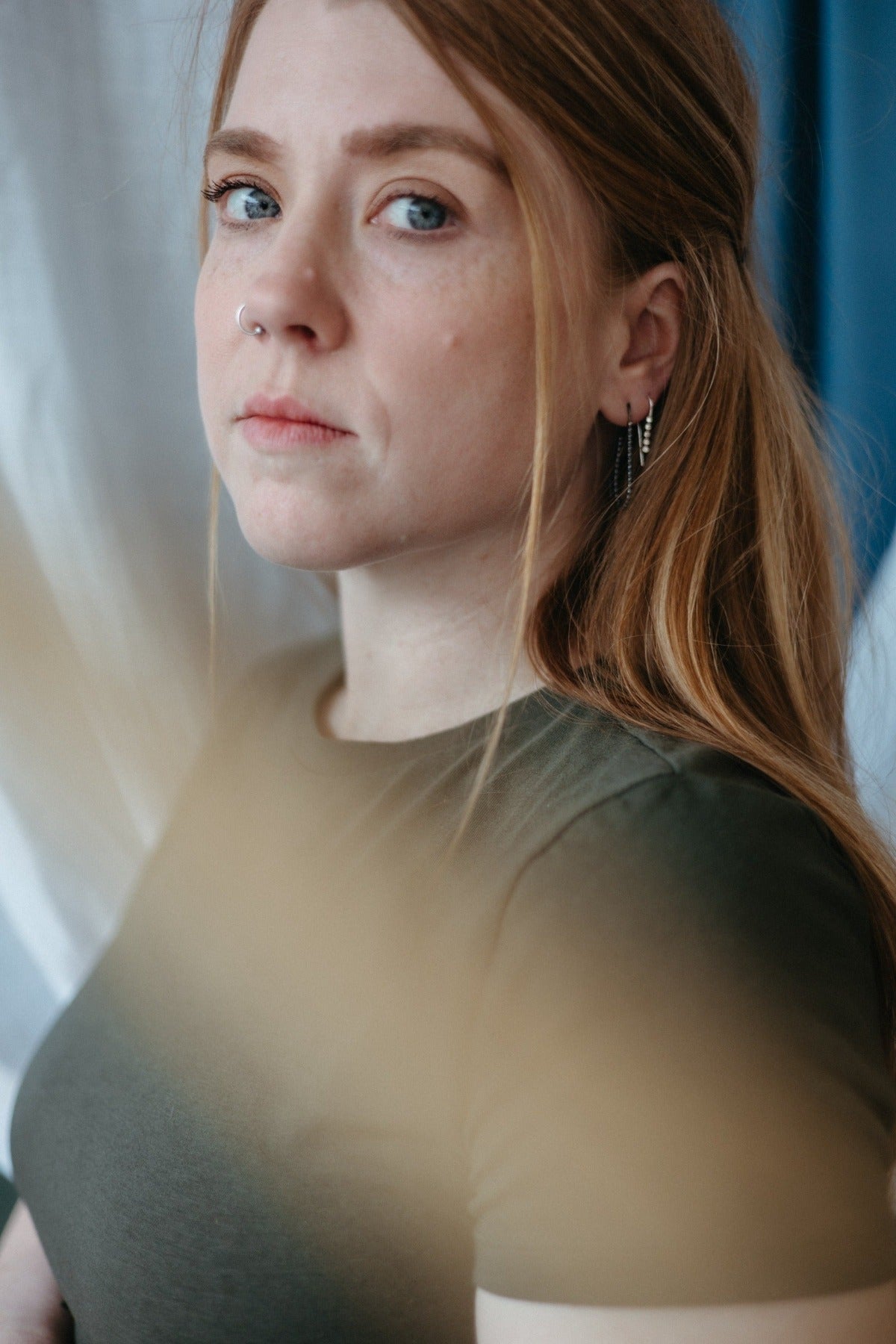 charcoal and silver teardrop hoop earring stack styled on model