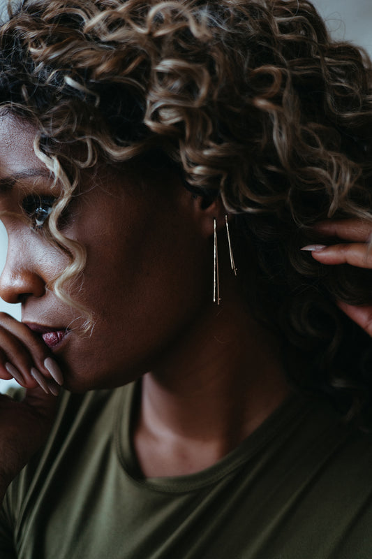 xtall and petite trapezoid wire pull-through hoops styled on model