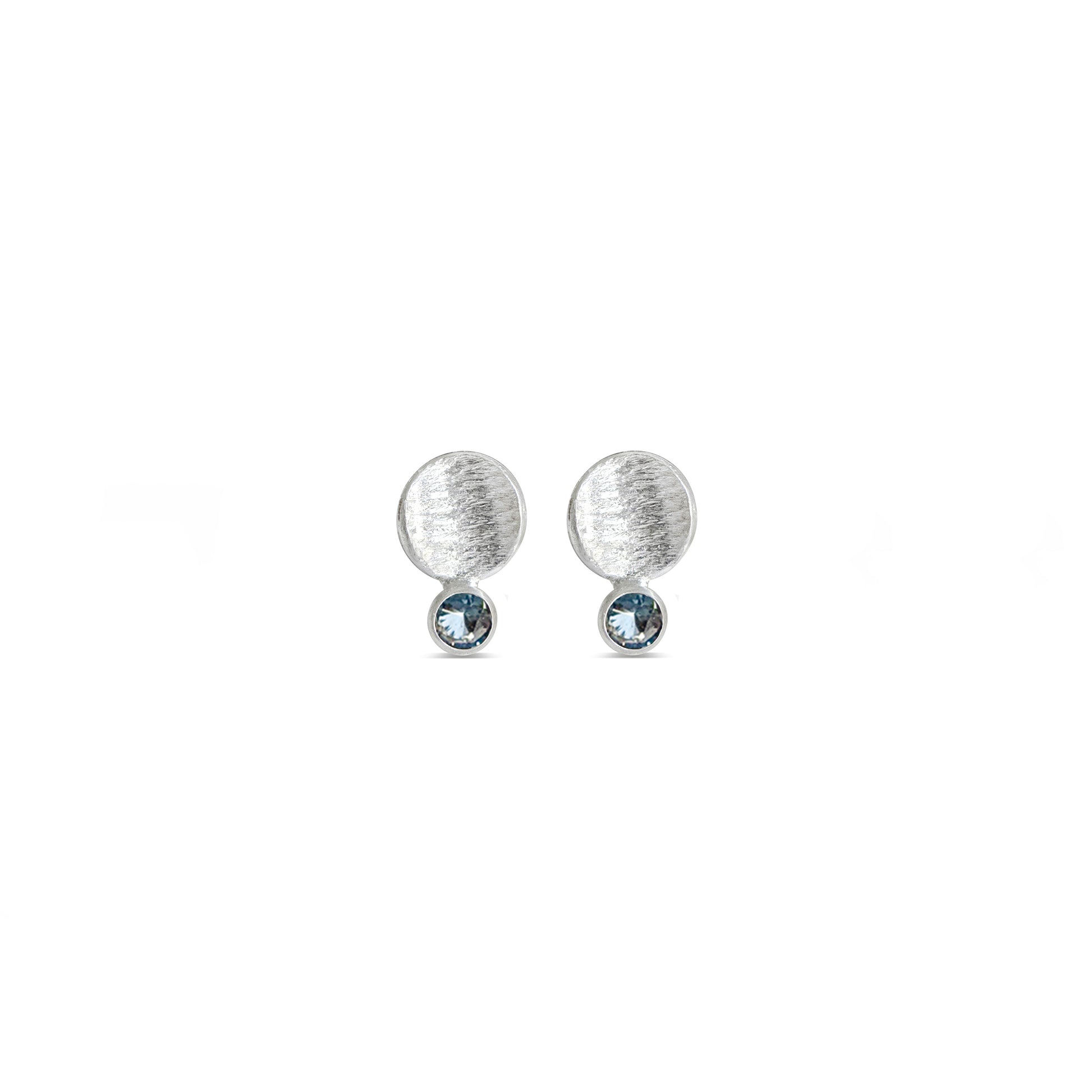 Small silver textured disk studs with blue sapphires