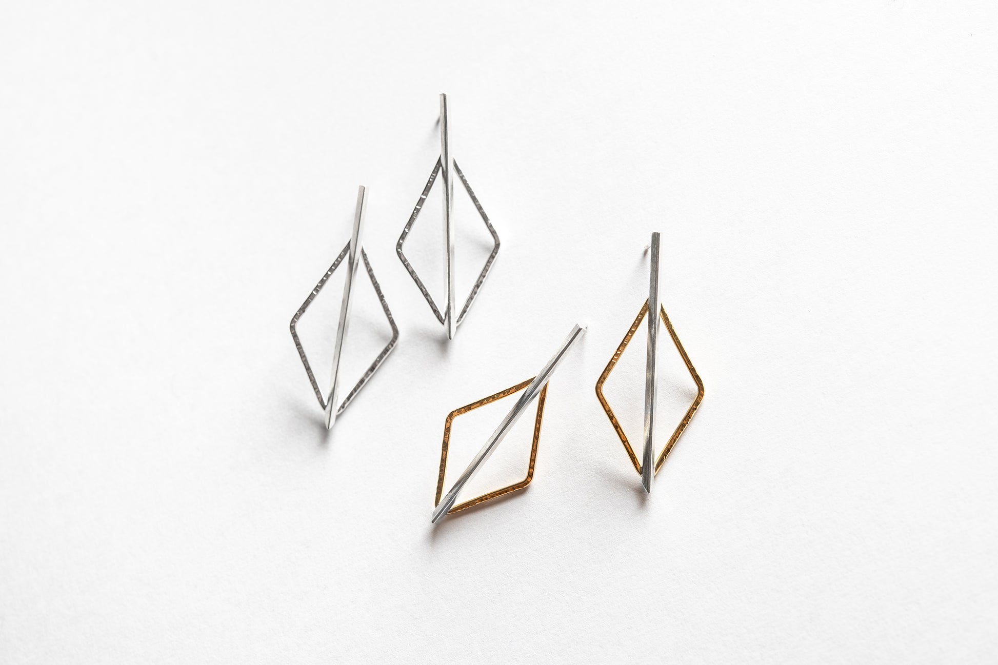 Silver and gold diamond halo with bar studs