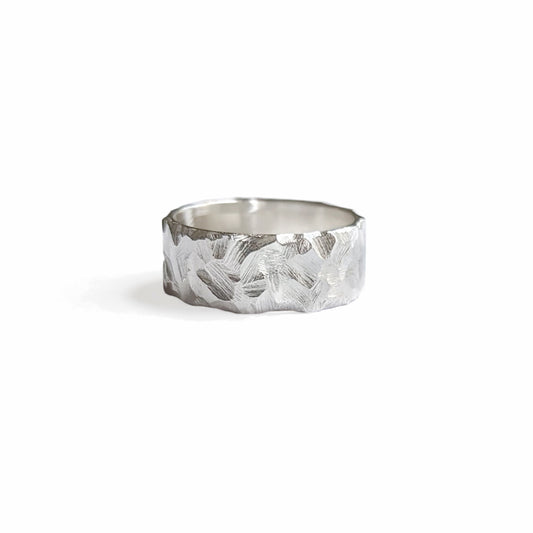 Hammered rocky textured thick banded silver ring