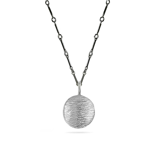 silver linen-textured disk charm on charcoal bar chain necklace