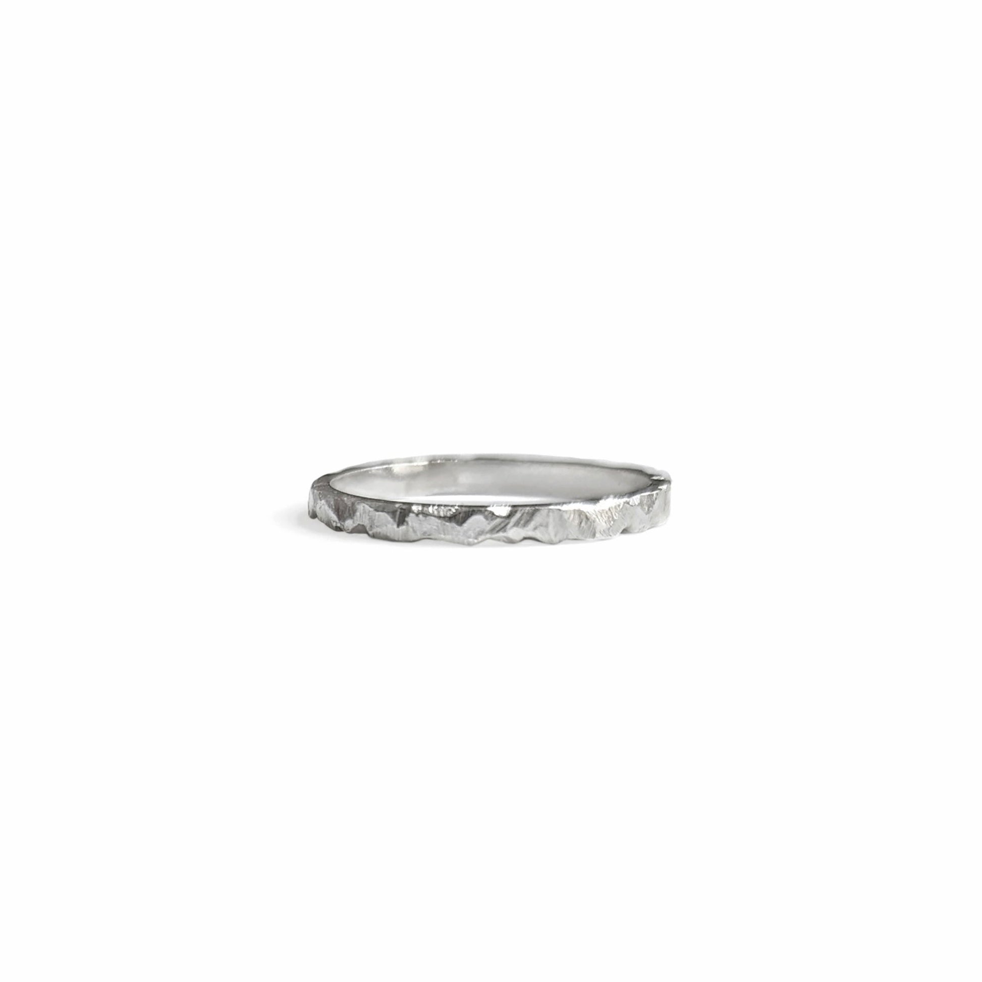 Slim silver rocky textured ring