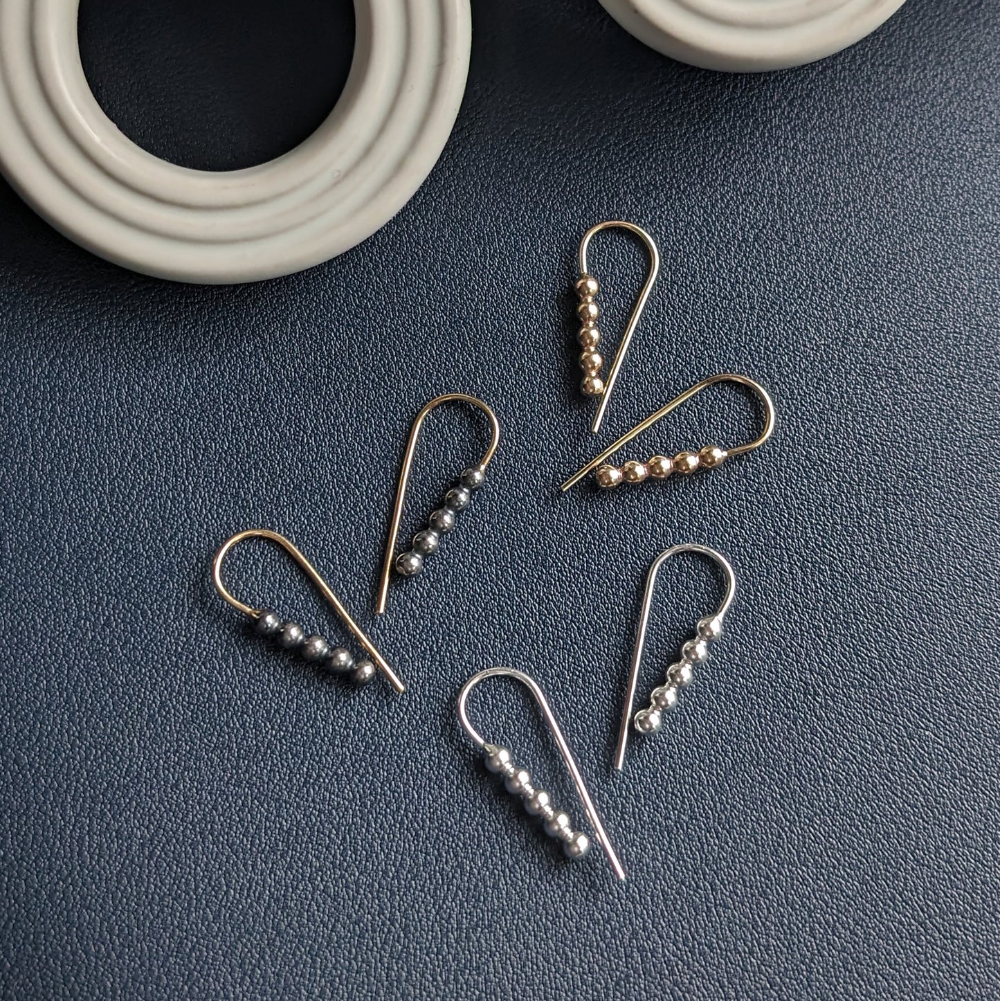 silver, gold, and two-tone charcoal and gold beaded wire teardrop earrings