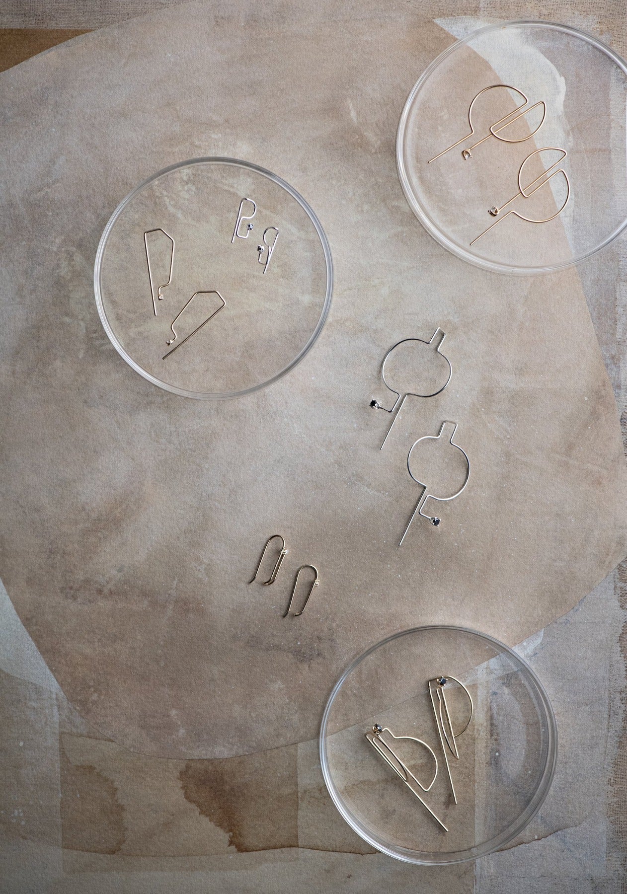 Delicate fine gemstone jewelry handcrafted with recycled metals