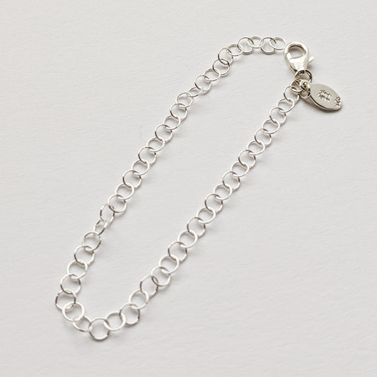 Round silver cable chain extender with clasp and charm