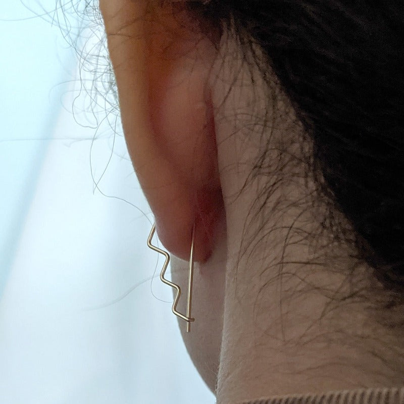 14K gold delicate zigzag step threader hoop earrings on model