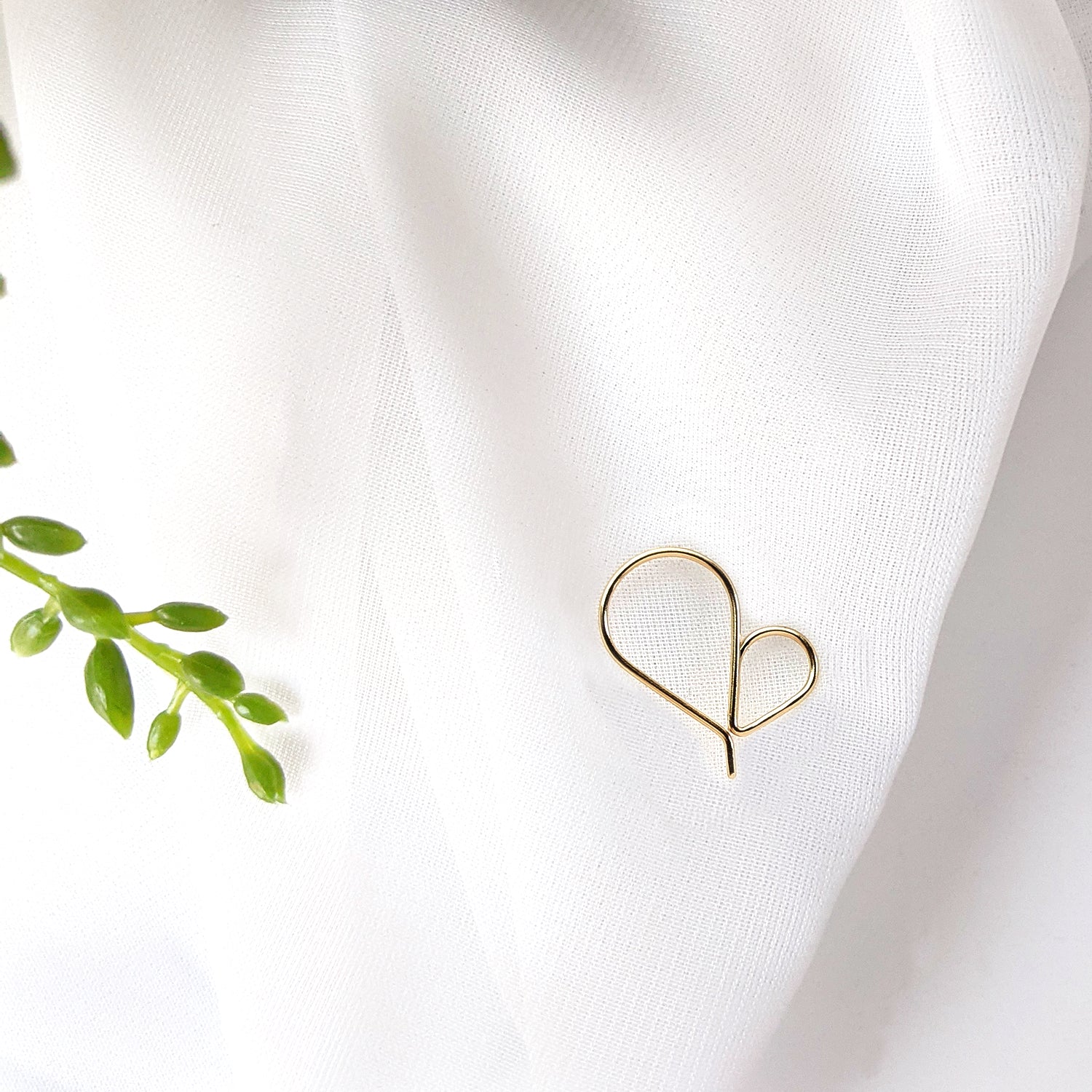 single 14K gold delicate heart-shaped threader hoops
