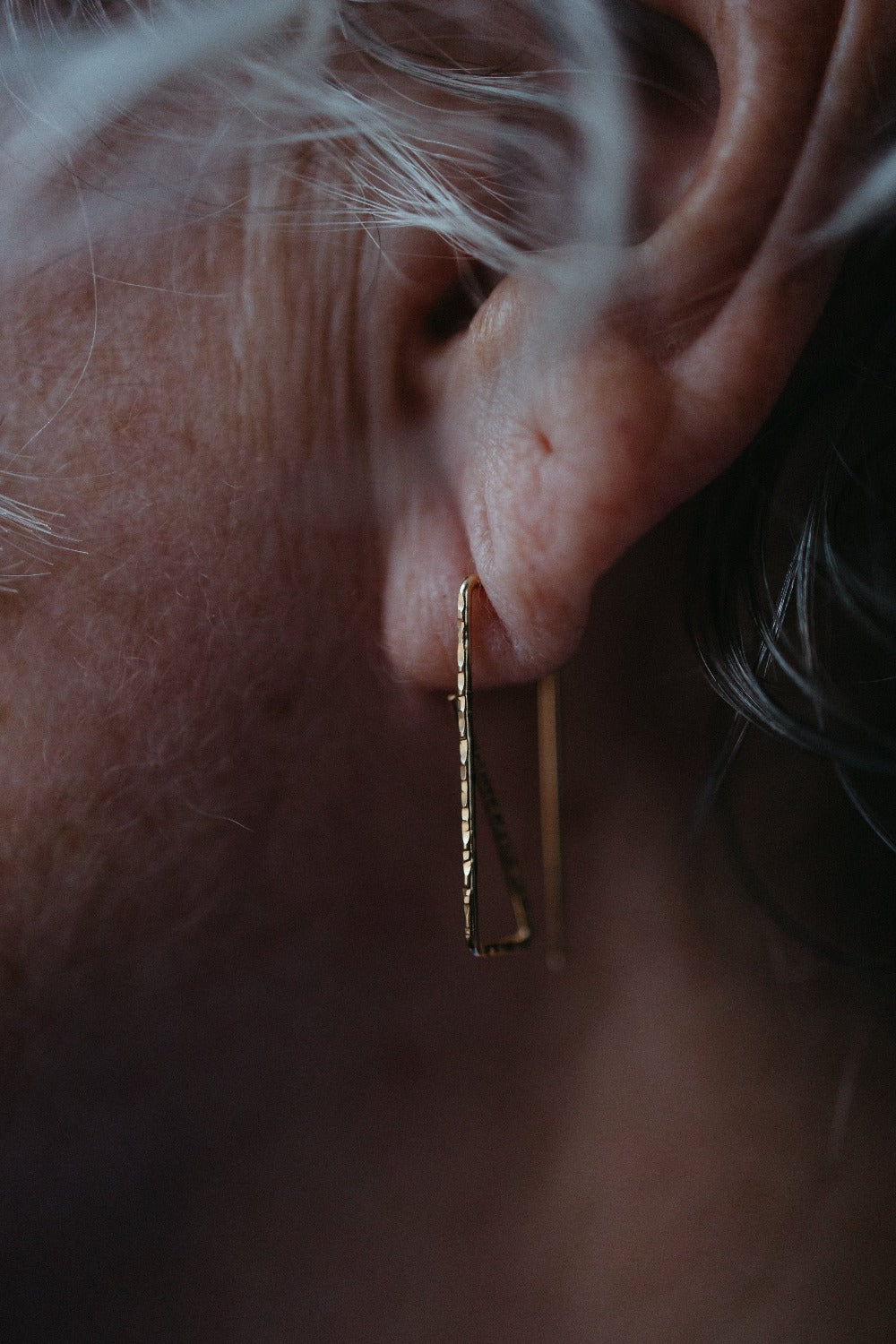 14k gold rectangle threader hoops on model
