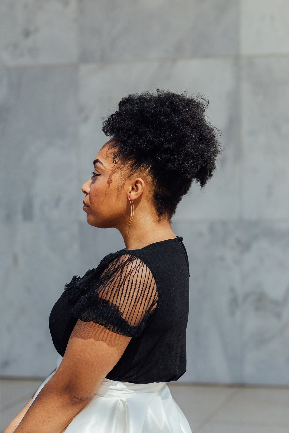 Elongated rectangle pull through threader hoops in gold on model