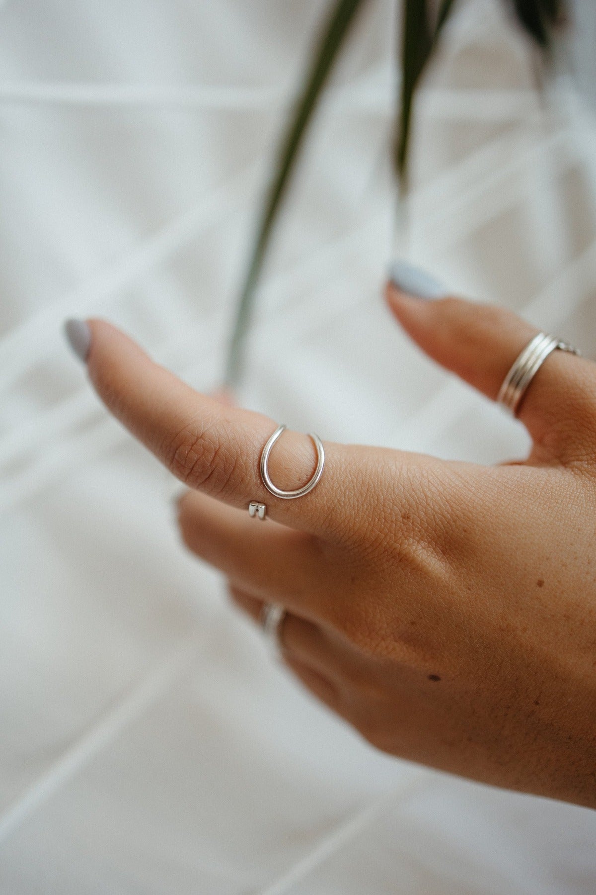 Silver tear drop wrap around ring