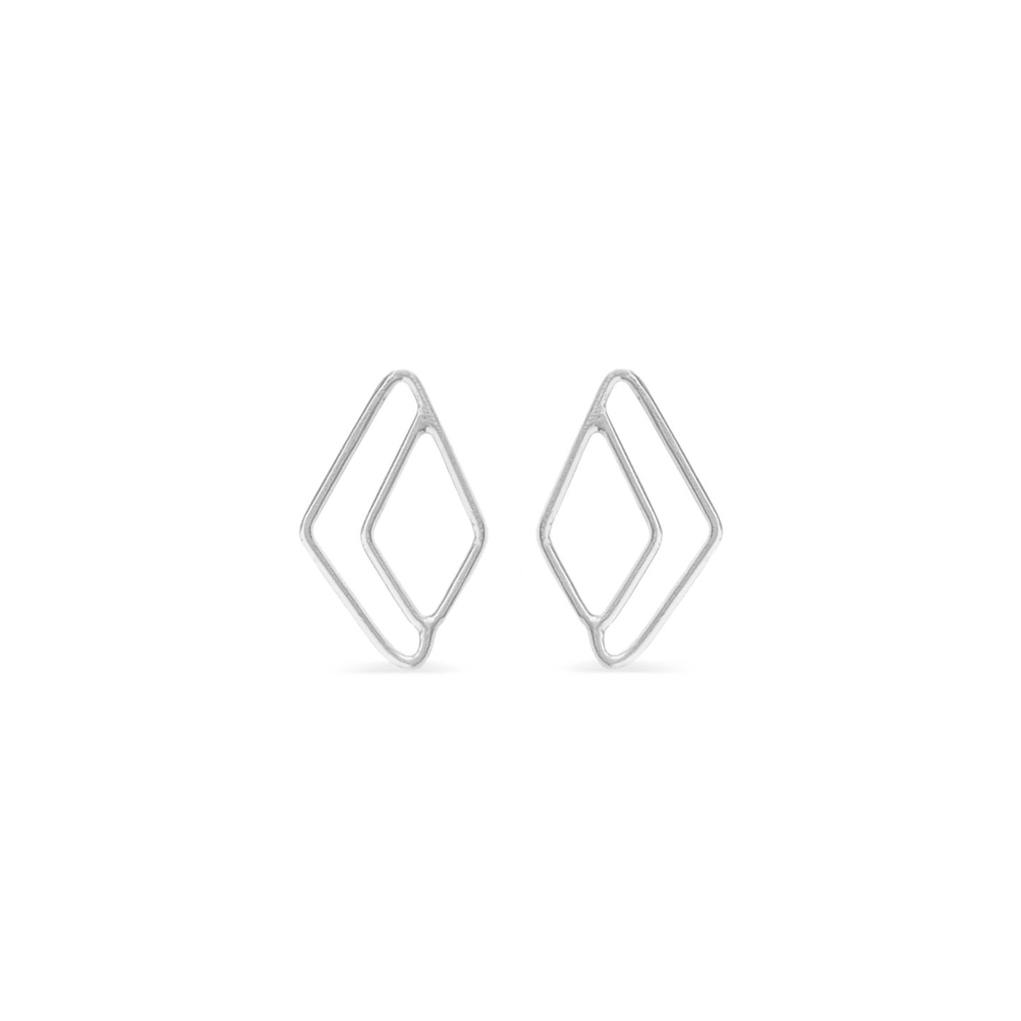 Open asymmetrical diamond stud earrings in silver