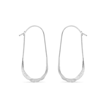Oval hammered hoop earrings in sterling silver