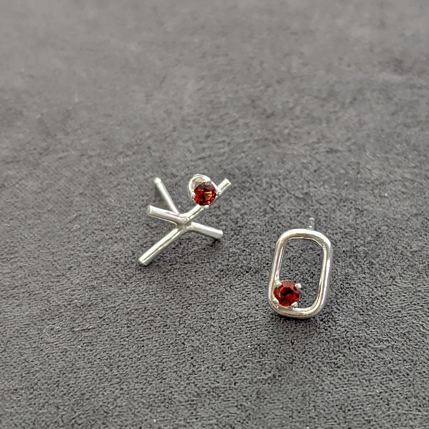 XO Garnet stud post earrings in silver