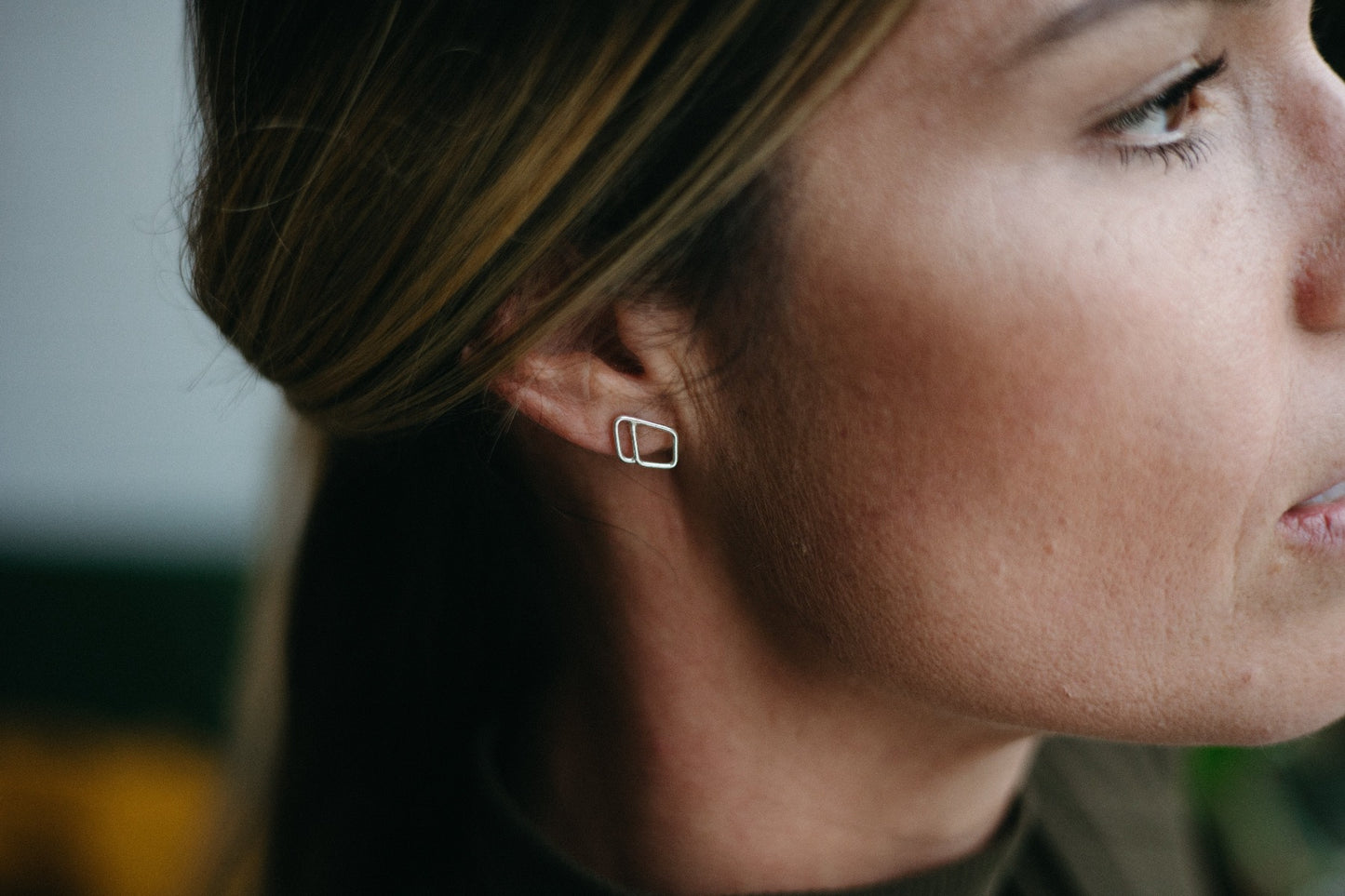 Asymmetrical outlined diamond studs