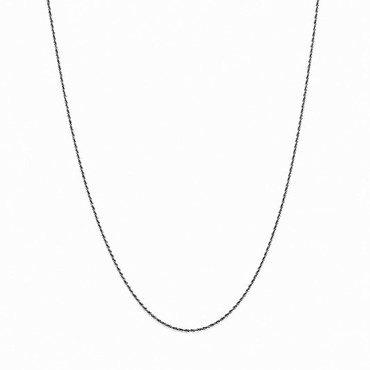A delicate black chain necklace shown against a plain white background, forming a U-shape.