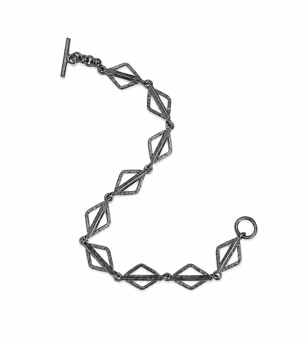 Geometric bracelet with diamond-shaped links on a white background