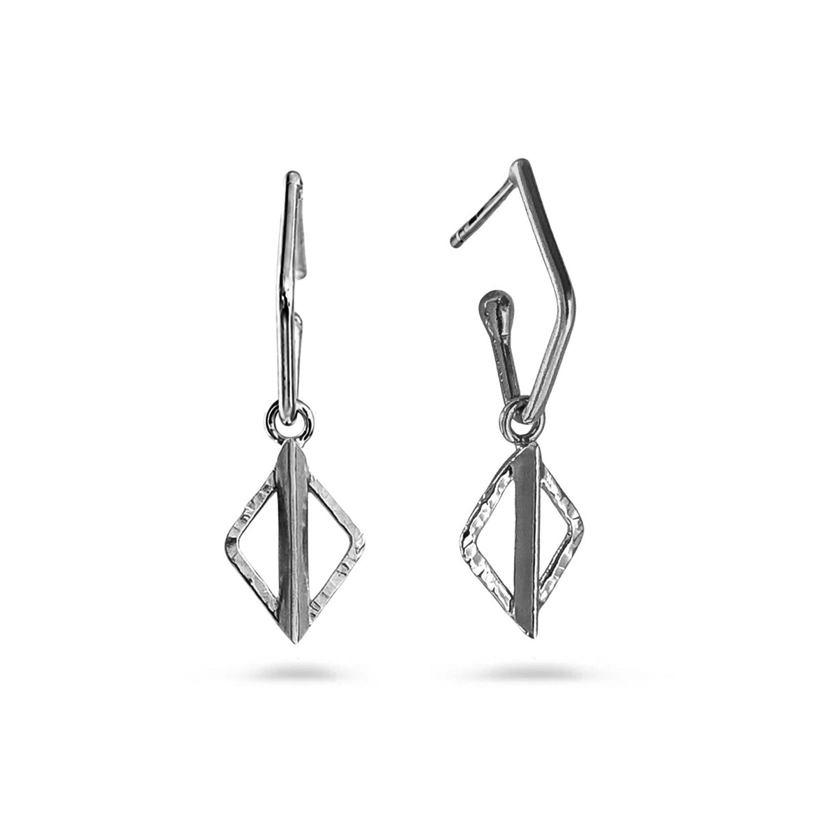 A pair of silver geometric drop earrings with a textured diamond-shaped pendant and leverback closures, shown against a plain white background.