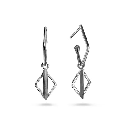A pair of silver geometric drop earrings with a textured diamond-shaped pendant and leverback closures, shown against a plain white background.