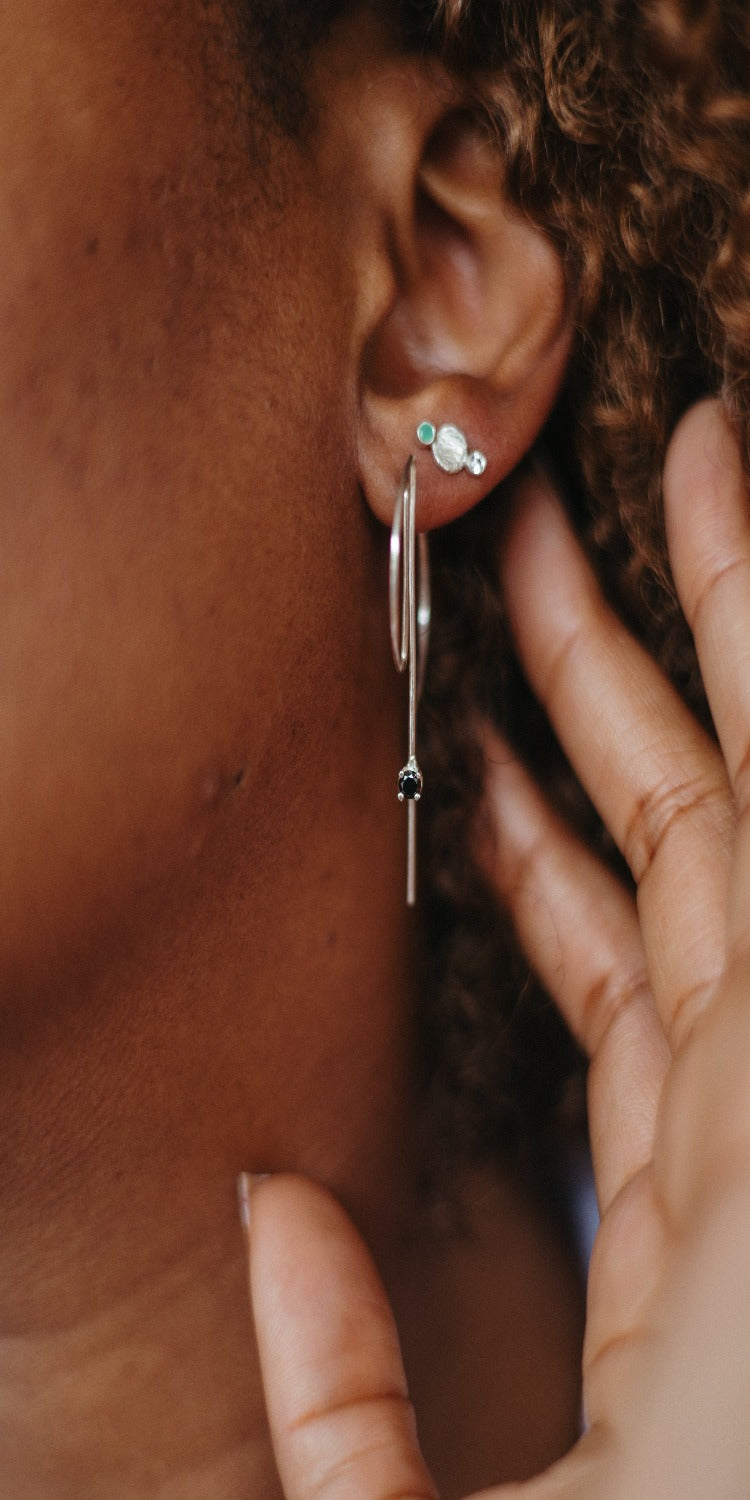 silver D shape hoop earrings in silver with diamonds
