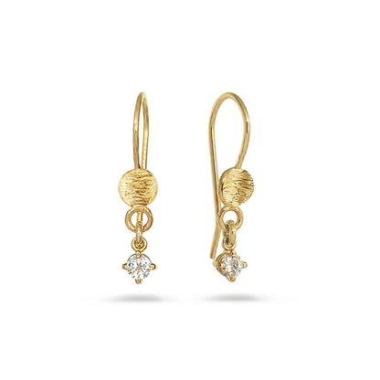 Pair of gold drop earrings with clear round-cut gemstone dangling at the bottom, on white background.