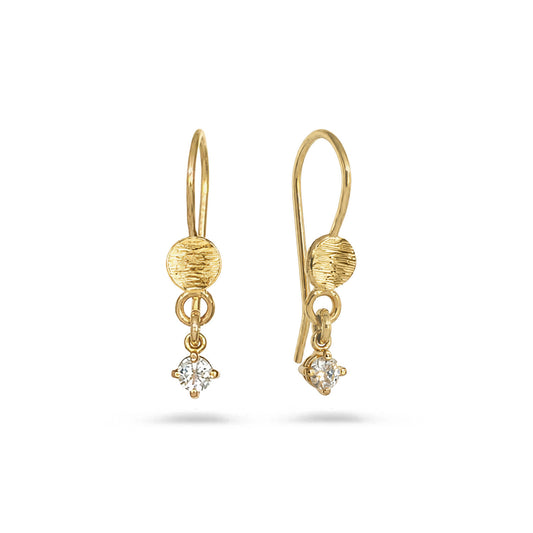 Pair of gold drop earrings with clear round-cut gemstone dangling at the bottom, on white background.