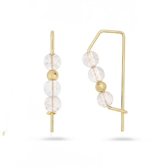 Gold hoops with stacked rose quartz gemstone beads on white background