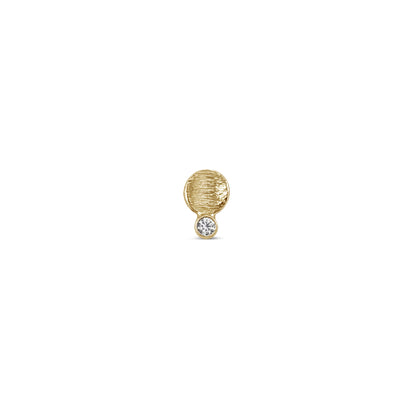 single small textured gold disk stud with a diamond