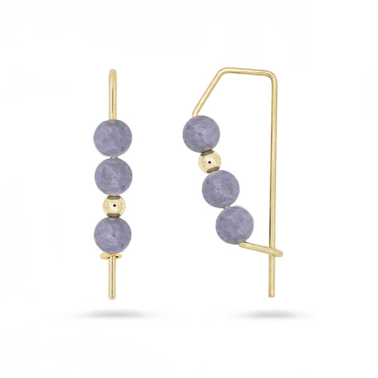 Gold hoops with stacked lavender gemstone beads on white background