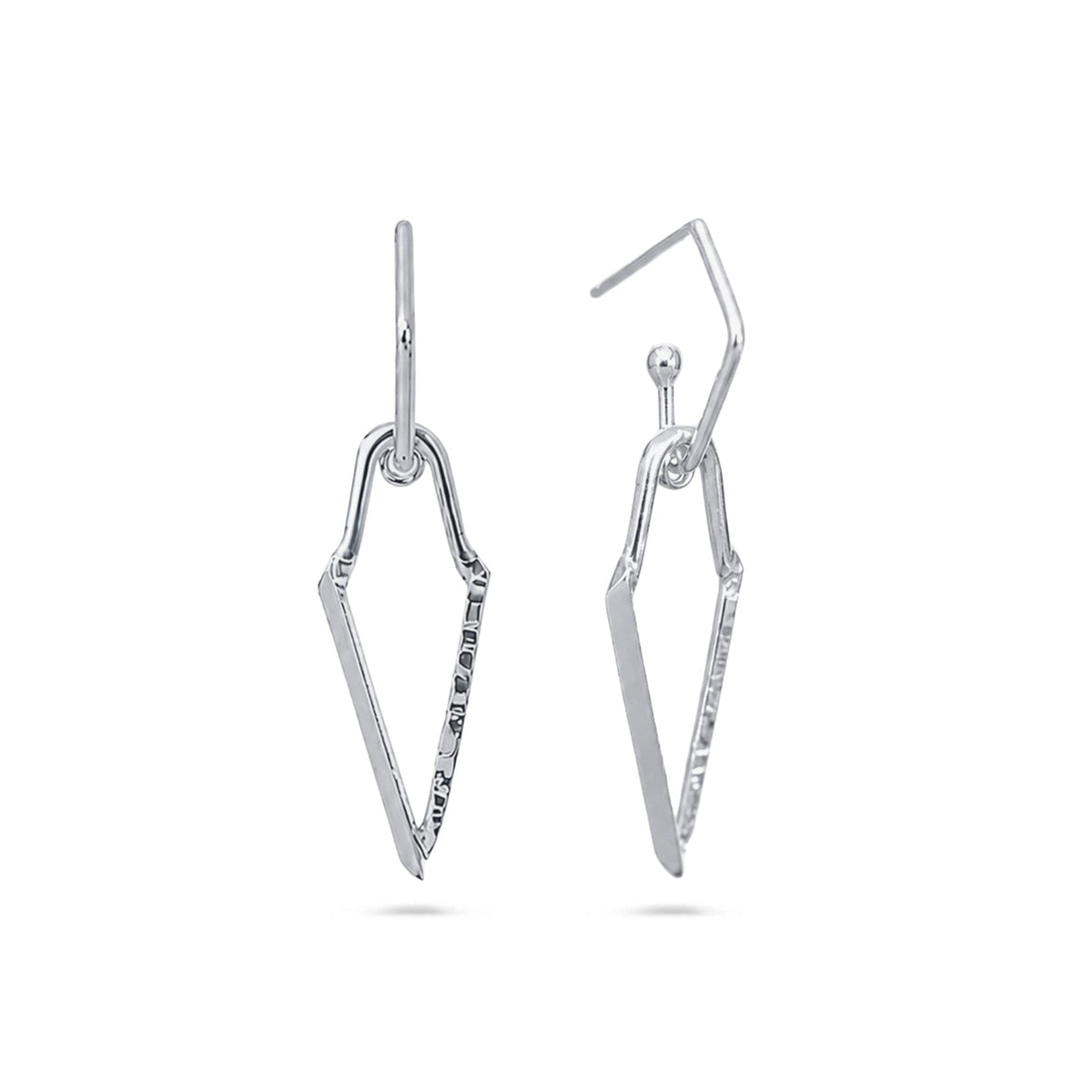 A pair of silver drop earrings with a geometric, openwork chevron or arrow-like design, shown against a plain white background.