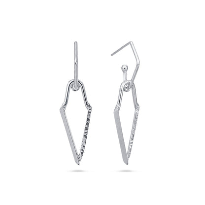 A pair of silver drop earrings with a geometric, openwork chevron or arrow-like design, shown against a plain white background.