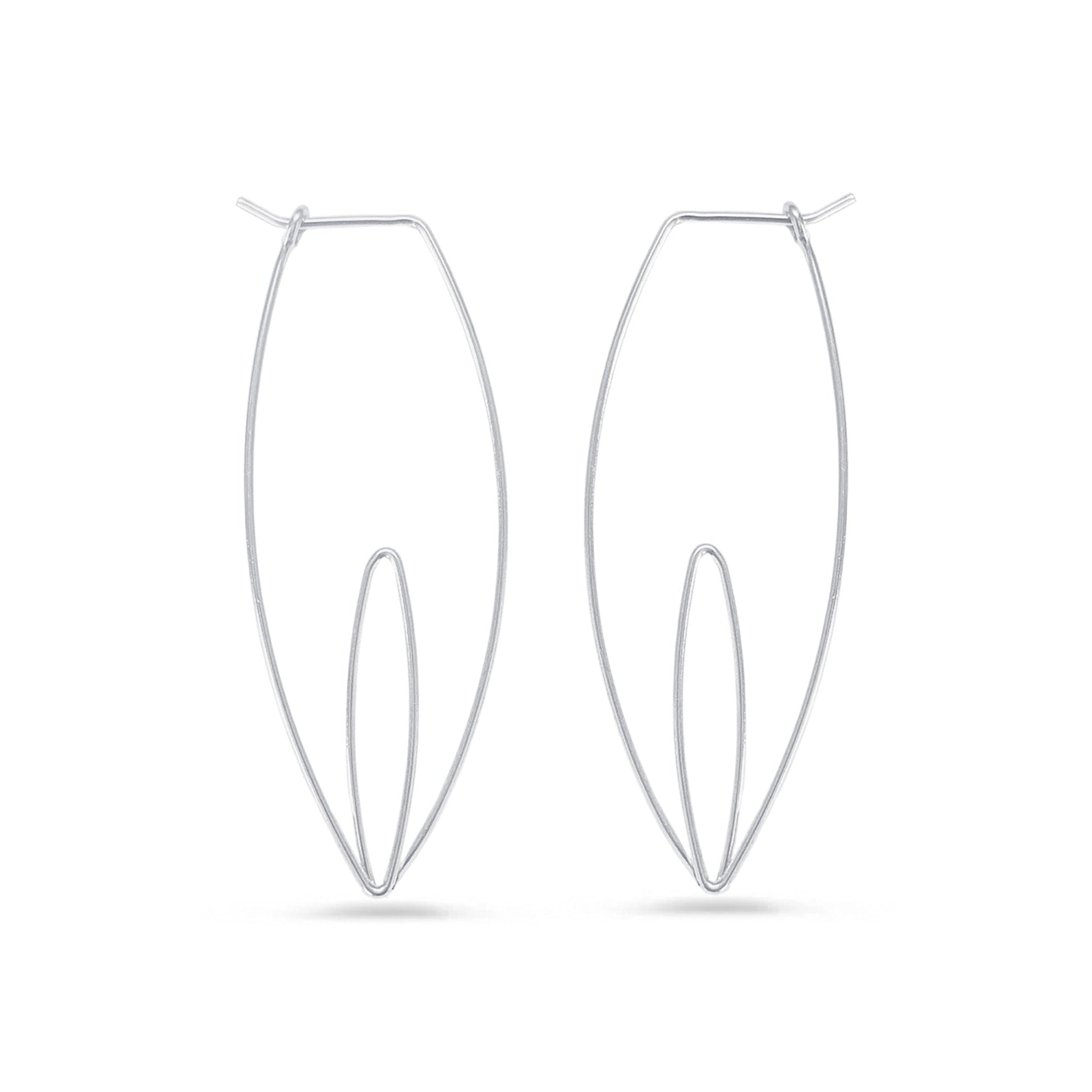 A pair of silver nature-inspired hoop earrings on a white background.