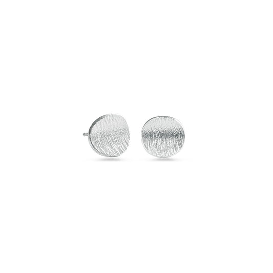 Round sterling silver studs on a white background