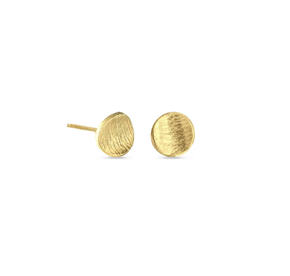Pair of gold textured stud earrings on white background