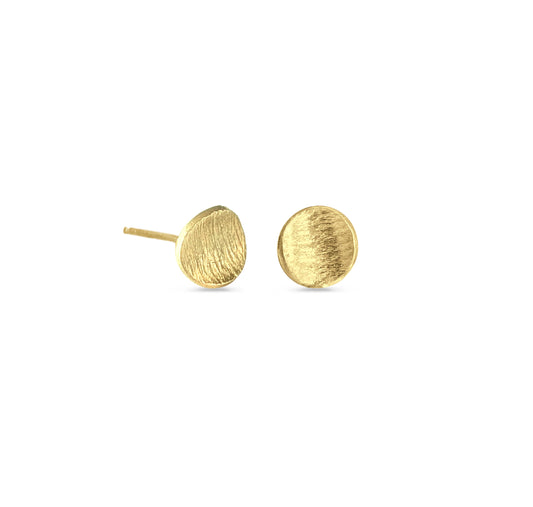 Pair of gold textured stud earrings on white background