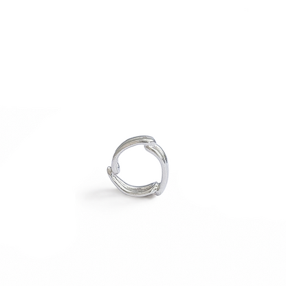 Sterling silver open ring spacer charm on white background