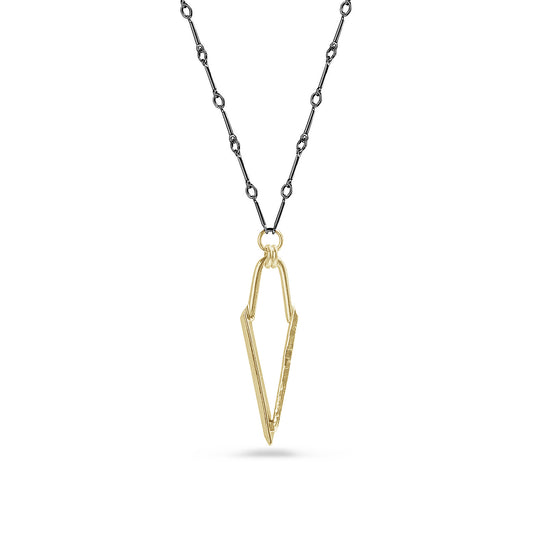 gold dagger pendant with black bar link chain