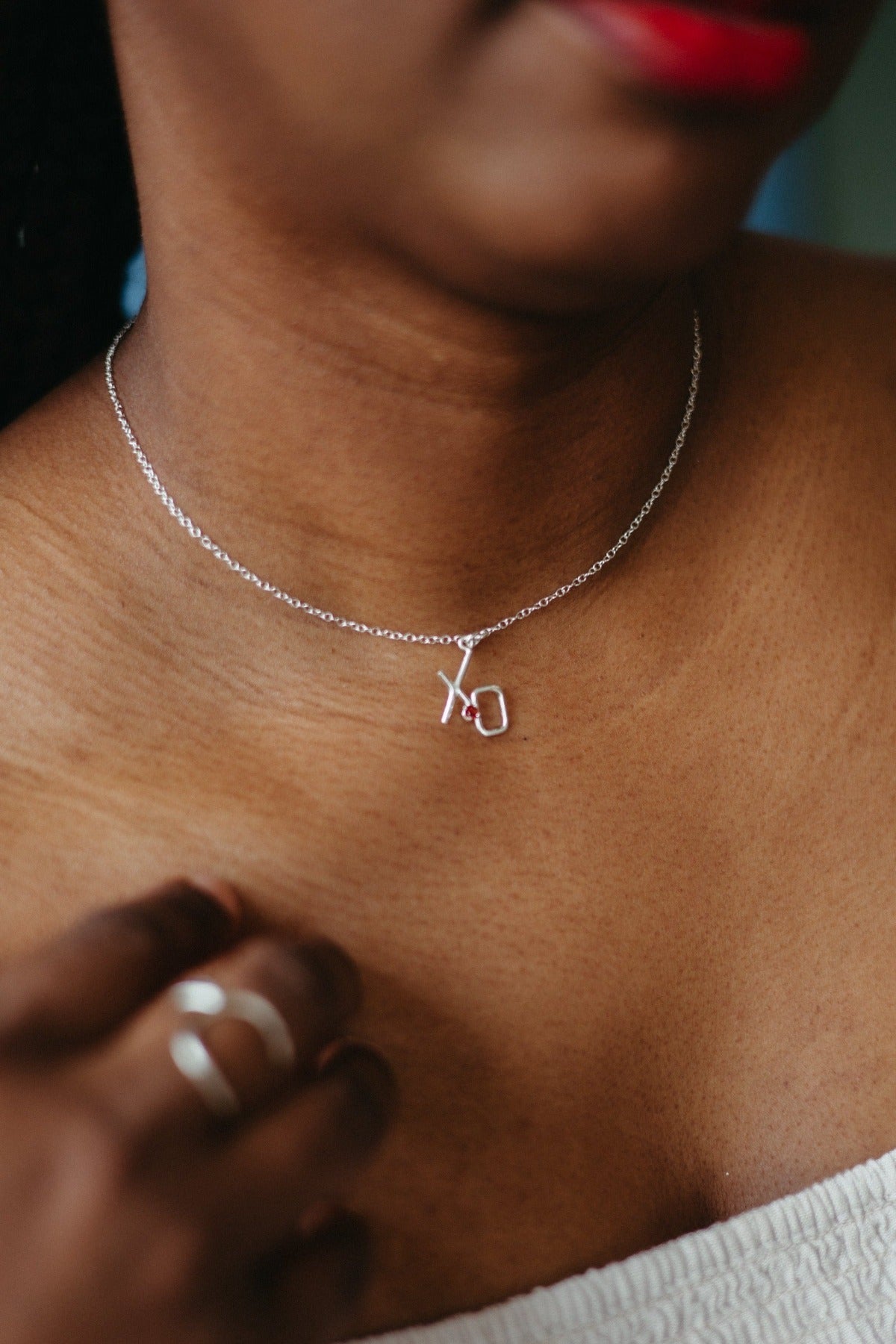 XO Garnet sterling silver pendant necklace