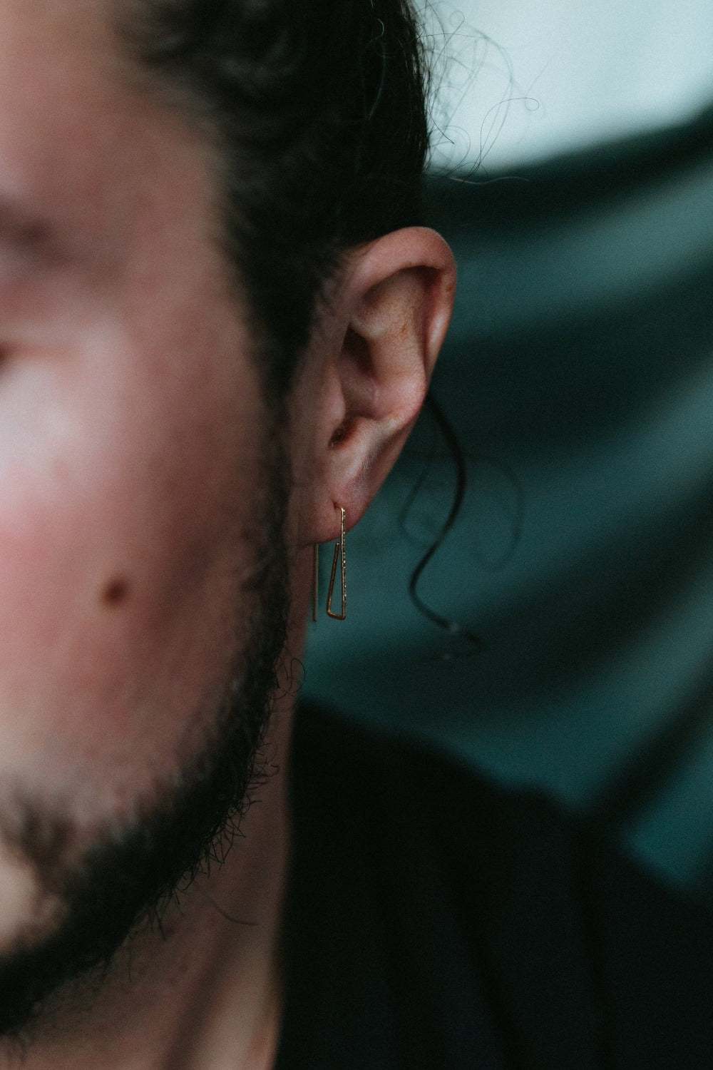 model wearing rectangle hoop earrings