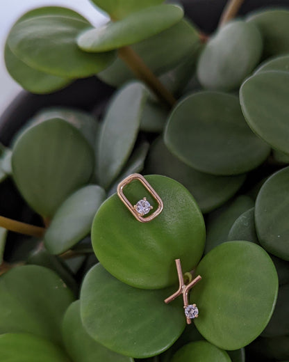 Moissanite XO post earrings in 14K gold