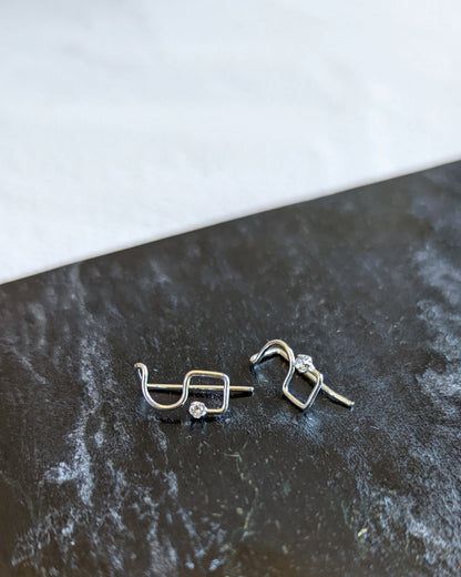 Dainty ear climber earrings with moissanites in silver