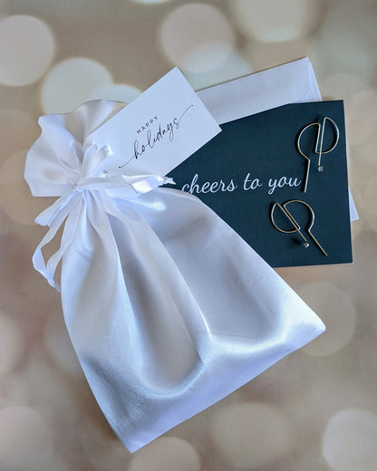 Brand holiday gift wrapping packaging with note card and gift tag for jewelry
