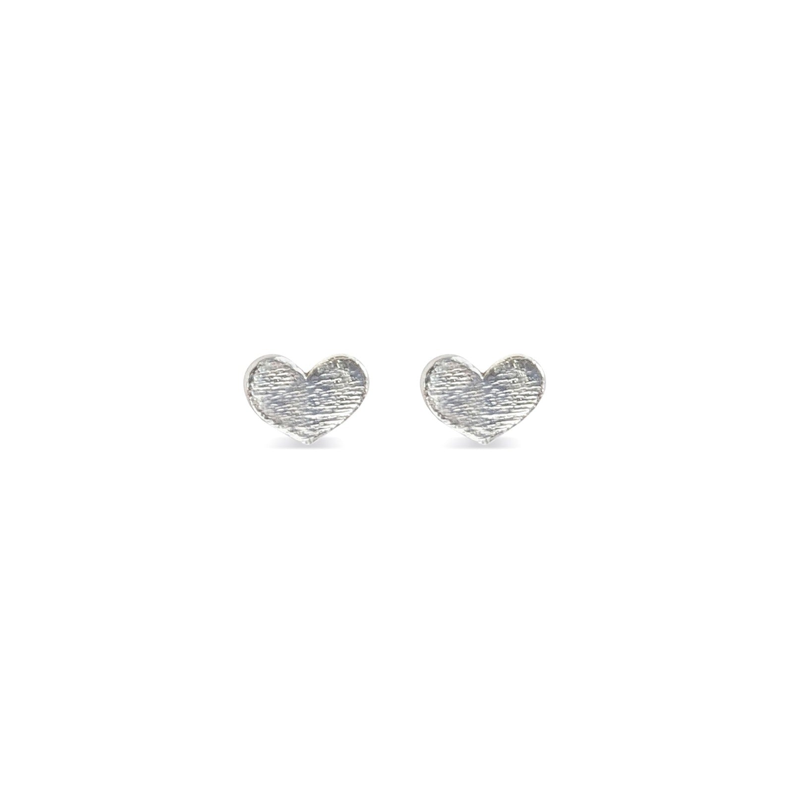 Tiny silver heart stud earrings with texture