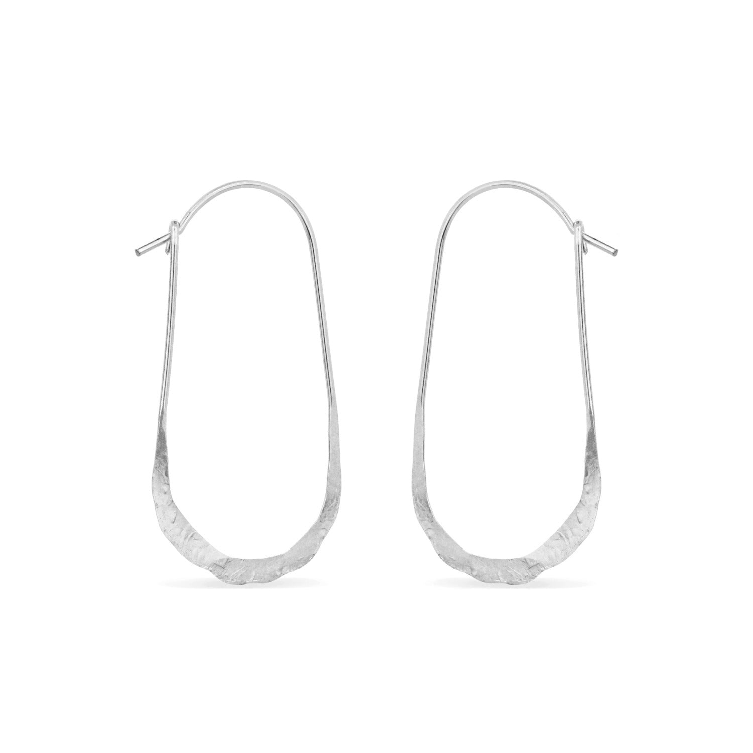 Oval hammered hoop earrings in sterling silver