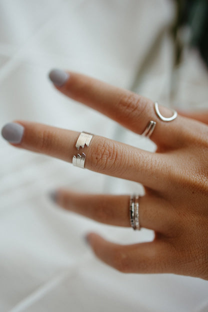 Open tiered zig zag ring band styled on model